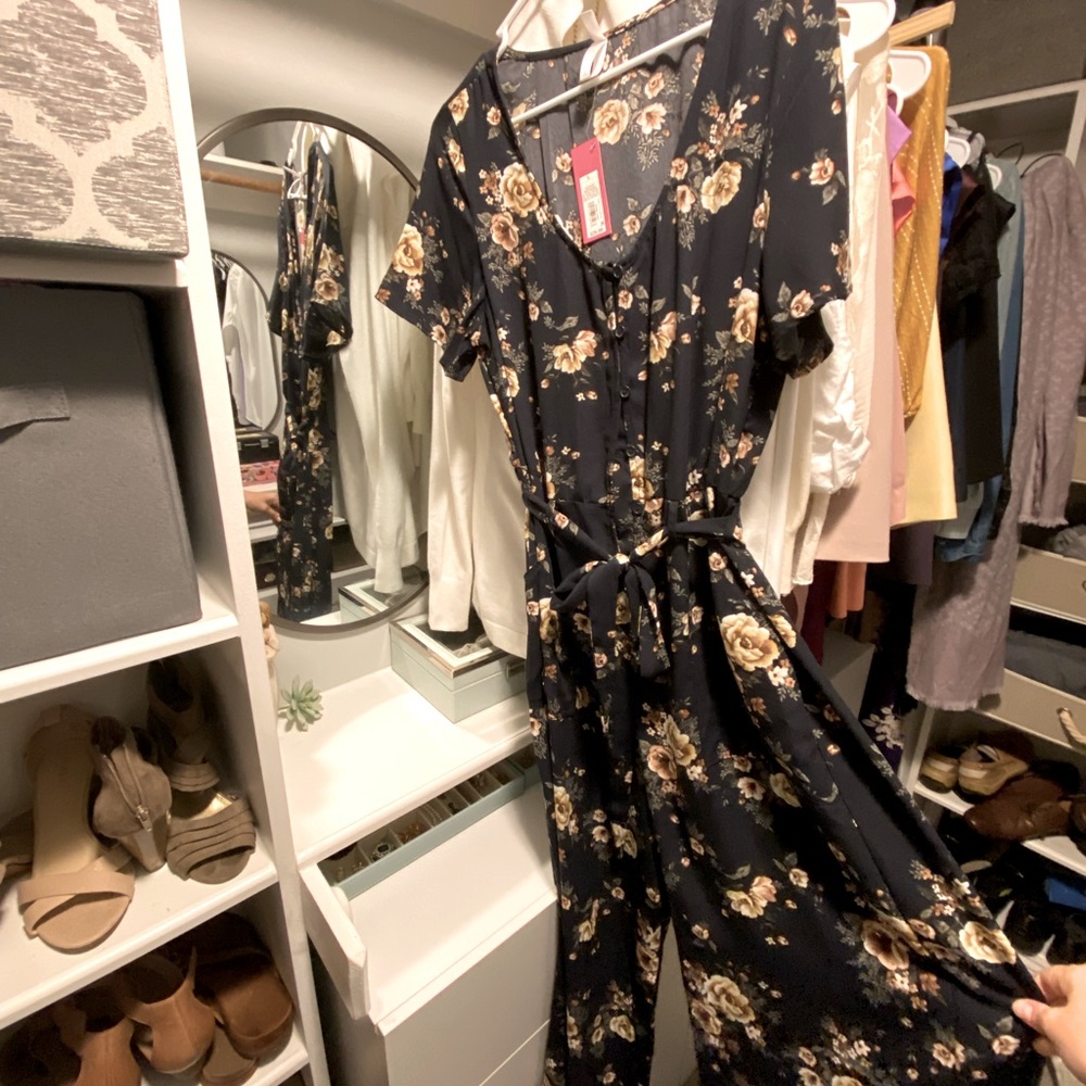 Navy floral romper jumpsuit, new with tags